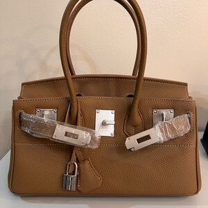 Genuine Leather Shoulder Bag, size 29, with silver hardware.